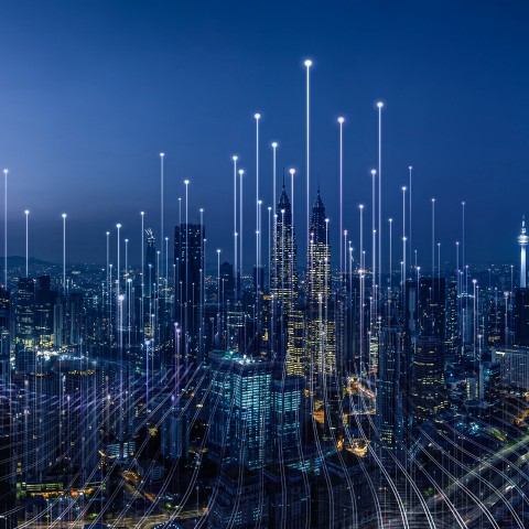 Connected city skyline representing digitally integrated procurement logistics
