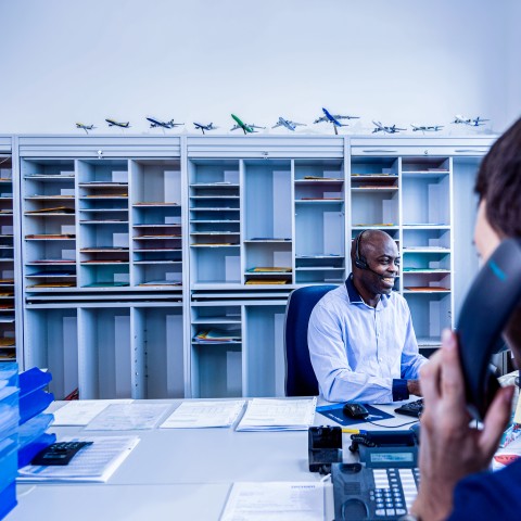 Customs security professionals working in an office environment