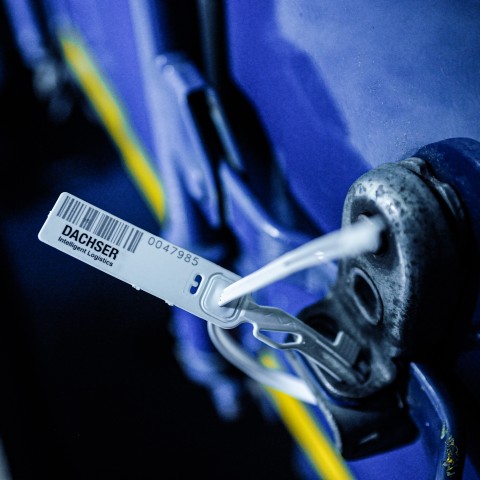 DACHSER security seal attached to a truck door
