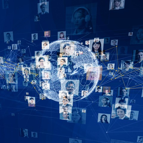Global network of people connected around a digital globe